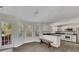 Eat in kitchen with stainless appliances, granite countertops and bright white cabinetry at 3635 Spring Mesa Dr, Snellville, GA 30039