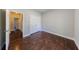 This is a bedroom featuring wood floors and a closet at 6490 Lake Esther Dr, Fairburn, GA 30213