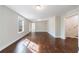 Large living area featuring hardwood flooring, neutral paint, and recessed lighting at 6490 Lake Esther Dr, Fairburn, GA 30213