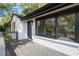 Inviting front porch with painted brick, providing a cozy outdoor space to relax and enjoy the surroundings at 1194 Clearview Ne Dr, Brookhaven, GA 30319