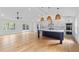 Bright open living space featuring modern furnishings, a spacious kitchen island, and stainless appliances at 1194 Clearview Ne Dr, Brookhaven, GA 30319