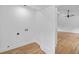 Bright laundry room with hardwood floors and white walls, offering a clean and functional space at 1194 Clearview Ne Dr, Brookhaven, GA 30319