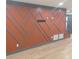 Stylish geometric accent wall, complemented by sleek wood-look floors and trim at 2565 Cloud Ln, Decatur, GA 30034