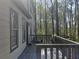 Charming back deck offers a serene outdoor space with views of the surrounding woods at 2565 Cloud Ln, Decatur, GA 30034