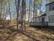 Large backyard featuring a deck and a privacy fence offers plenty of space for outdoor activities at 2565 Cloud Ln, Decatur, GA 30034
