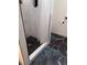 Modern bathroom features a stand-up shower with tile surround, a stylish floor, and updated fixtures at 2565 Cloud Ln, Decatur, GA 30034