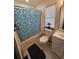 Bathroom with tub-shower combination, toilet, and vanity at 2565 Cloud Ln, Decatur, GA 30034