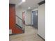 Warm entryway featuring modern flooring and a custom red accent wall with decorative trim at 2565 Cloud Ln, Decatur, GA 30034
