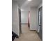 Inviting entryway boasting wood-look floors, neutral walls, and grey trim detail at 2565 Cloud Ln, Decatur, GA 30034