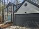 Charming two-story home featuring a blend of modern and traditional exterior design elements at 2565 Cloud Ln, Decatur, GA 30034