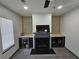 Living room featuring a modern fireplace, custom built-ins, and a beverage cooler at 2565 Cloud Ln, Decatur, GA 30034