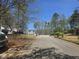 Street view shows a well-maintained neighborhood with mature trees and sidewalks at 2565 Cloud Ln, Decatur, GA 30034