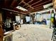 Unfinished basement, featuring concrete floor and cinder block walls at 6917 Laurelwood Dr, Douglasville, GA 30135