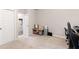 Bedroom area with carpet, minimal furniture, and a chair at 1661 Flagstone Ln, Conyers, GA 30012