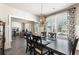 Bright and airy dining room with views through the window and an open concept layout at 1661 Flagstone Ln, Conyers, GA 30012