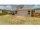 A fenced backyard provides privacy for this home's patio and living area at 1661 Flagstone Ln, Conyers, GA 30012