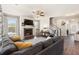 Spacious living room with fireplace, large windows, and neutral decor and comfortable seating at 1661 Flagstone Ln, Conyers, GA 30012