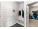 Mud room with access to coat hooks, keys, and storage at 1661 Flagstone Ln, Conyers, GA 30012