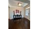 Elegant foyer with hardwood floors, decorative lighting, and stylish console table at 526 Rosemont Ave, Canton, GA 30115