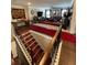Spacious living room with hardwood floors, TV, and staircase at 526 Rosemont Ave, Canton, GA 30115