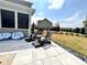 Back patio featuring outdoor seating and a serene yard view, perfect for enjoying the outdoors at 526 Rosemont Ave, Canton, GA 30115