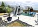 Incredible pool featuring a water slide, surrounded by luxurious landscaping and lounge areas at 526 Rosemont Ave, Canton, GA 30115