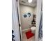 Well lit powder room featuring unique decor and a modern toilet at 526 Rosemont Ave, Canton, GA 30115