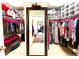 Walk in closet offering ample storage and multiple levels of hanging rods at 526 Rosemont Ave, Canton, GA 30115