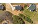 Aerial view of the property showcasing a large backyard, driveway, and surrounding neighborhood at 81 Bridgemill Dr, Douglasville, GA 30134