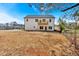 Expansive backyard with graded land, perfect for outdoor activities and landscaping opportunities at 81 Bridgemill Dr, Douglasville, GA 30134