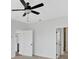 Bedroom with ceiling fan and multiple doorways at 81 Bridgemill Dr, Douglasville, GA 30134