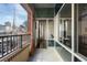 Open-air balcony showing city views and exterior windows into the home's interior at 845 Spring St # 125, Atlanta, GA 30308