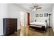 Cozy bedroom featuring a comfortable bed, dresser, and ample closet space for a restful retreat at 845 Spring St # 125, Atlanta, GA 30308