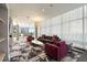 Community room with floor to ceiling windows, modern furnishings and city views at 845 Spring St # 125, Atlanta, GA 30308