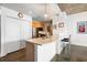 Modern kitchen with stainless steel appliances, breakfast bar, and ample cabinet space with efficient design at 845 Spring St # 125, Atlanta, GA 30308