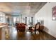 Open concept living room with polished concrete floors, modern lighting, and large windows filling the space with light at 845 Spring St # 125, Atlanta, GA 30308