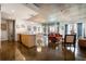 Open concept living room with polished concrete floors, modern lighting, and large windows filling the space with light at 845 Spring St # 125, Atlanta, GA 30308