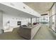 Spacious resident lounge with fireplace, sofa, and seating areas at 845 Spring St # 125, Atlanta, GA 30308