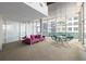 Bright resident lounge with modern furnishings and city views at 845 Spring St # 125, Atlanta, GA 30308