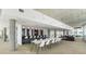 Large resident lounge with a bar and long table for meetings or social gatherings at 845 Spring St # 125, Atlanta, GA 30308