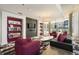 Modern lounge area with stylish furnishings, including bookshelves and media center at 845 Spring St # 125, Atlanta, GA 30308