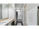 Modern bathroom with dual vanity, sleek fixtures, and shower-tub combo in neutral tones at 10 Perimeter Summit Ne Blvd # 1204, Brookhaven, GA 30319
