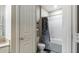 Bright bathroom with a shower-tub combo and stylish shower curtain at 10 Perimeter Summit Ne Blvd # 1204, Brookhaven, GA 30319