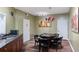 Card table and wet bar in game room with granite countertop at 10 Perimeter Summit Ne Blvd # 1204, Brookhaven, GA 30319