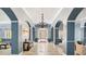 Villa Sonoma lobby boasts neutral tones, tile floors, and a chandelier at 10 Perimeter Summit Ne Blvd # 1204, Brookhaven, GA 30319