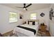 Well-lit bedroom with natural light, contemporary decor, and modern furnishings at 1048 Pinehurst Se Dr, Smyrna, GA 30080