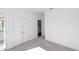 Bright bedroom featuring plush carpeting, white walls, double door closet, and natural light at 1132 Larkin Dr # 34, Buford, GA 30518