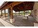 Community amenity with a fireplace, a large table, seating and ceiling fans at 1132 Larkin Dr # 34, Buford, GA 30518