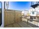 Wooden deck with decorative railing and lattice, offering a private outdoor space at 1132 Larkin Dr # 34, Buford, GA 30518