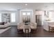 Open-concept living space with dining area connecting to a modern kitchen at 1132 Larkin Dr # 34, Buford, GA 30518